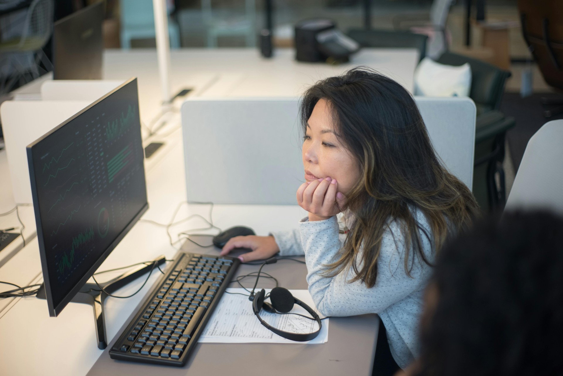 Woman By Computer
